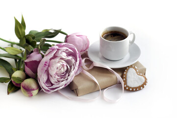 pink peonies, gift box, coffee cup, heart shaped cookies on white background. card for valentine's day, mother's day.