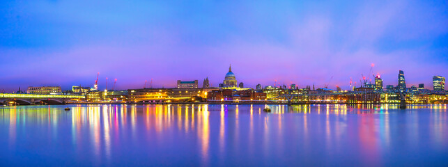 Colorful skyline panorama of London overlooking dome of St. Paul's cathedral