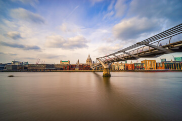 Fototapeta na wymiar St Paul's Cathedral and Millennium Bridge in London. England