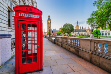 Big Ben and red telephone booth in London seen from parliament square. United Kingdom 