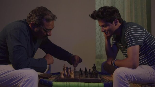 Chess is a two player strategy board game played on a checkered board with 64 squares arranged in an 64 square grid. High quality Full HD footage - Powered by Adobe