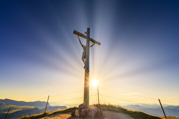 Jesus Christ on the Cross with sun rays 