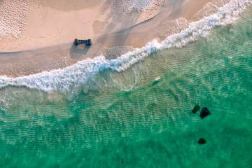 Fototapeten Aerial top view of beautiful sea waves. Summer sea beach in sunny day © surakit