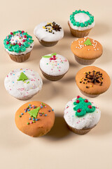 Group of muffins decorated for Christmas, vertical shot
