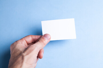 Fototapeta premium white small paper in hand