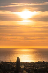 Sunrise in Barcelona overlooking the sea horizon 