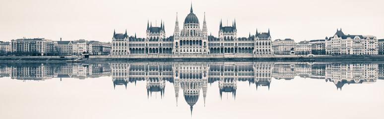 Fototapeta premium Vintage panorama of Hungarian Parliament in Budapest - extra sky space left for text 