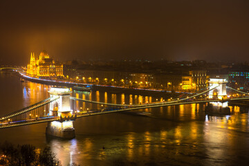 Fototapeta na wymiar Panorama of Budapest at night overlooking Chain bridge and Hungarian parliament