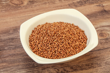 Raw buсkwheat cereal in the bowl