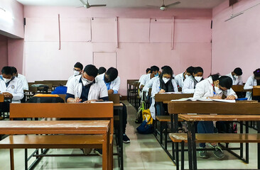 December 10, 2020. Siliguri, West Bengal India. Medical students in mask and white coat giving exam...