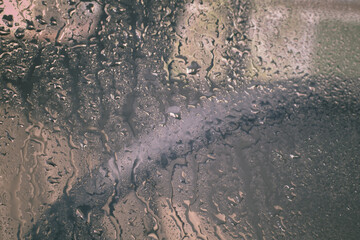 Water rain drops blue Vintage on glass wall on car rain drops on clear window or rain droplets on glass Of Raindrops Or Vapor Trough Window Glass Water droplets blue and Rain droplets
