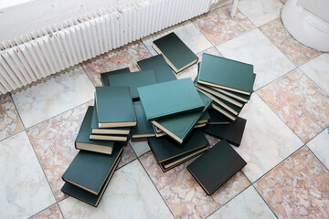 pile of discarded books