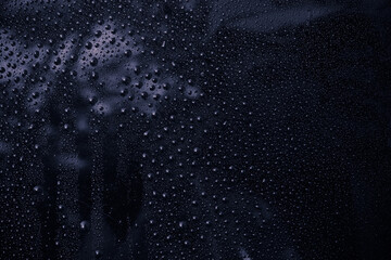 Water rain drops  blue Vintage on glass wall  on car  rain drops on clear window  or rain droplets on glass Of Raindrops Or Vapor Trough Window Glass Water droplets blue and Rain droplets