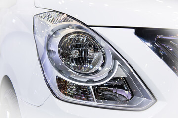 Headlight of a modern luxury car, auto detail,car care concept ,daytime running light