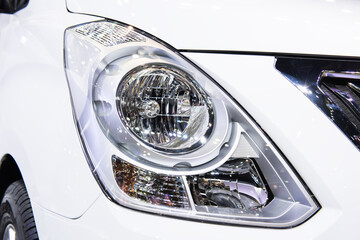 Headlight of a modern luxury car, auto detail,car care concept ,daytime running light