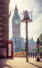 Red telephone box near Big Ben in London