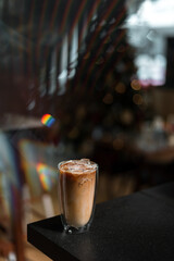 iced coffee latte on christmas holidays display background 