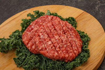 Raw beef burger cutlet for cooking