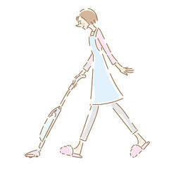 掃除機をかける可愛い主婦