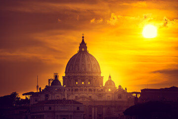 The dome of St peter's basilica  at sunset in Rome,Vatican