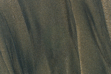 wet sand texture on ocean beach