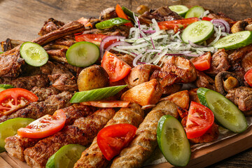 Grilled various meat mix vith vegetables