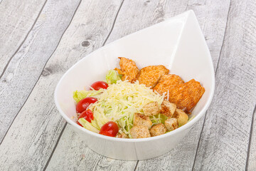 Caesar salad with chicken and parmesan