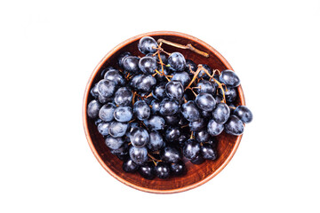 Fresh Dark blue purple grape isolated on white background.