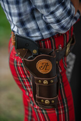 Close-up of a revolver cowboy in a holster. Wild West