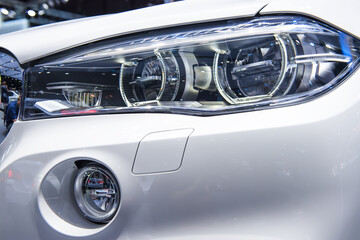 Headlight of a modern luxury car, auto detail,car care concept ,daytime running light