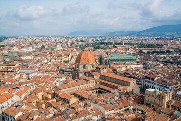 Fototapeta na wymiar Aerial view of Florence city skyline, Basilica di San Lorenzo in a sunny day, Italy