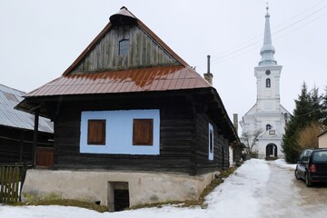 Interesting traditional wooden buildings in Sumiac (Šumiac) village, lying at feet of Kralova hola in Low Tatras in Slovakia © Iwona