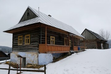 Interesting traditional wooden buildings in Sumiac (Šumiac) village, lying at feet of Kralova hola in Low Tatras in Slovakia © Iwona