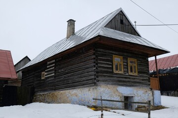 Interesting traditional wooden buildings in Sumiac (Šumiac) village, lying at feet of Kralova hola in Low Tatras in Slovakia © Iwona