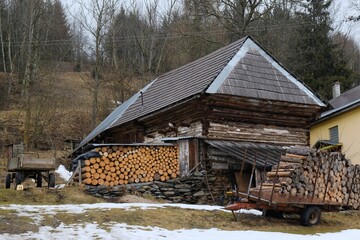 Interesting traditional wooden buildings in Sumiac (Šumiac) village, lying at feet of Kralova hola in Low Tatras in Slovakia © Iwona