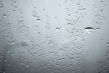 Rain drops on car windshield