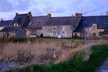 Fototapeta na wymiar The small village of Kerignon just in front of the salt marshes of Guérande. (west of France - december 2020)