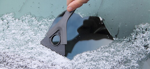 Scrape free a frozen car window