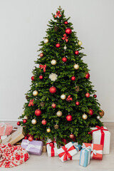Interior on New Year holiday gifts Christmas tree decor