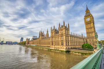 Fototapeta na wymiar Big Ben and British Parliament seen from Westminster Bridge in London. England