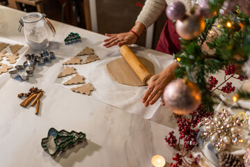 Vegan chef girl cooking sweets in christmas kitchen making chocolates and cookies for christmas