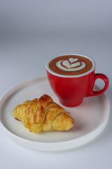 cup of coffee and croissant