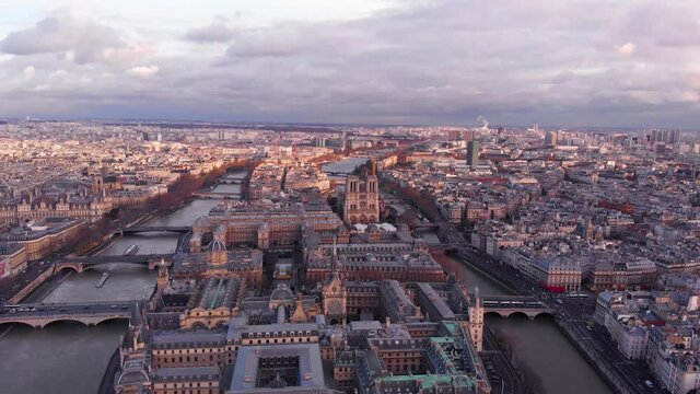 Beautiful Parisian Ile de la Cite and Notre-Dame view in the evening, aerial footage