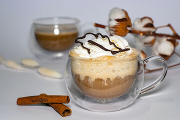 oak leaf printed on a 3d printer with chocolate on a latte cup