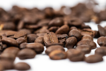 Black coffee beans on a white background