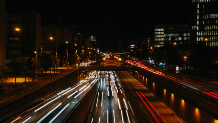 Fototapeta na wymiar Vehicle traffic at night in a metropolis. Barcelona, ​​long exposure night photography