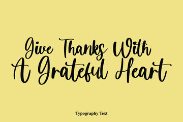 Give Thanks With A Grateful Heart Typescript Cursive Handwriting Calligraphy Phrase on Yellow Background