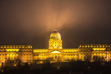 Fototapeta na wymiar Illuminated dome of the historic Royal Palace at Buda Castle in Budapest. Hungary 