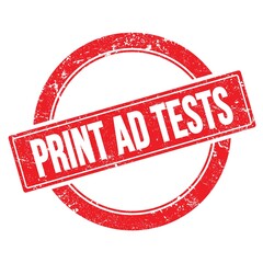 PRINT AD TESTS text on red grungy round stamp.