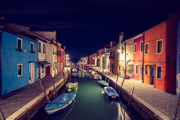 Architecture of colorful Burano island at night. Italy 